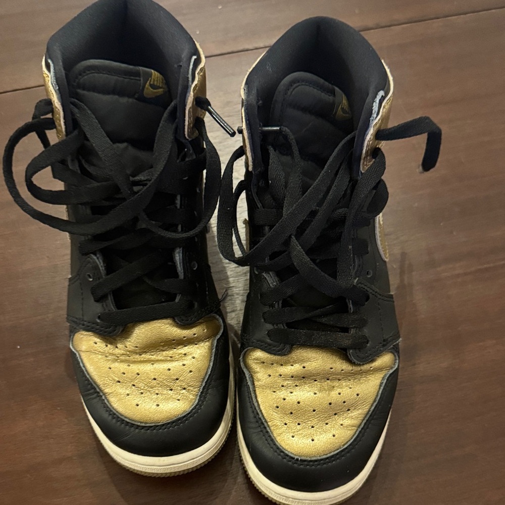 Air Jordan Nike Black and Gold Sneakers